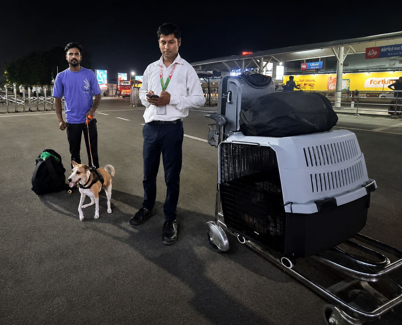 FidoJet handler with a pet ready for relocation from Trivandrum